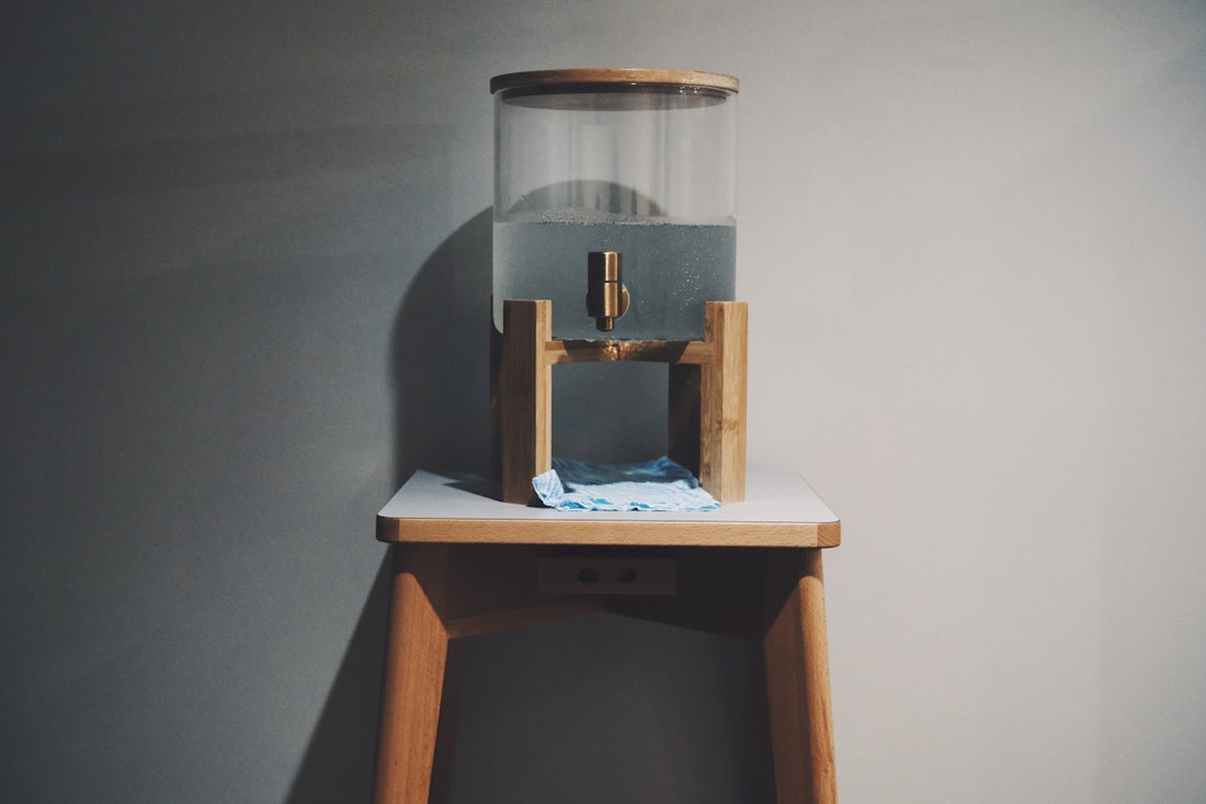 a glass container on a shelf